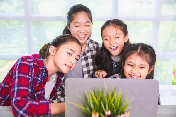 Student girls enjoy studying and learning from computer notebook — Stock Photo, Image