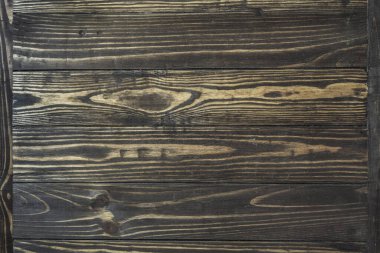 Ahşap zemin, boş yüzey. Eski tahtalar koyu kahverengidir. Köy tarzında ahşap fotofon. Yüksek kalite fotoğraf