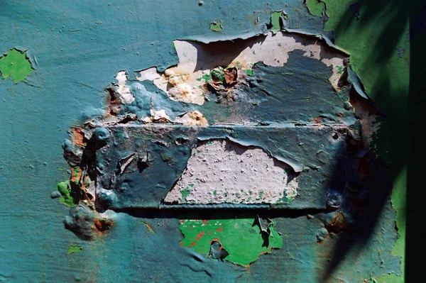 Yıpranmış metal duvarın soyut yakın çekim