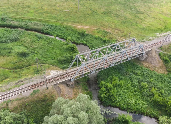 Railway bridge across the river - view from the drone