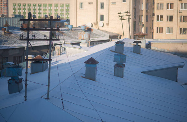 View of the roofs of urban houses, close-up  