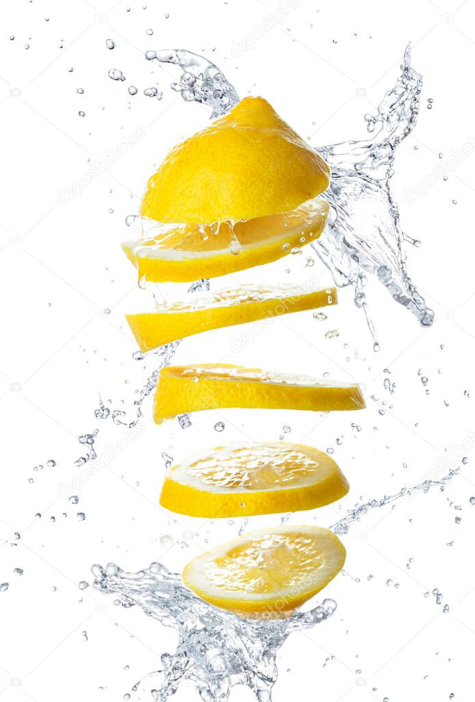 Sliced lemon with water on a white isolated background