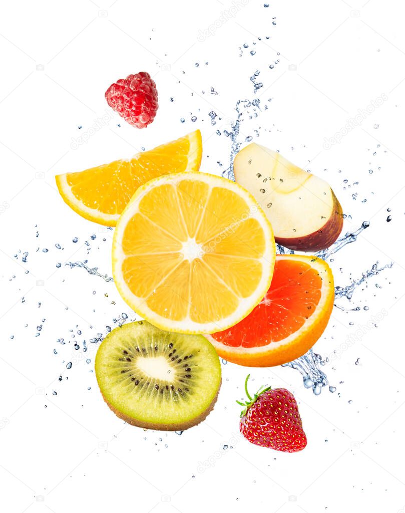 Fruits, berries and a splash of water on a white background