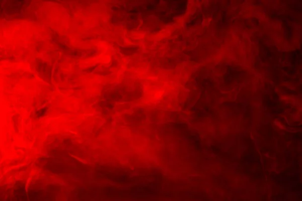 黒い背景に赤い煙 抽象的な背景 — ストック写真