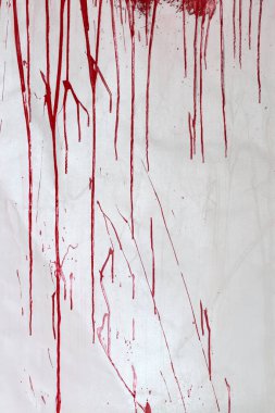 Duvarda akan kırmızı boyanın (kan) dokusu