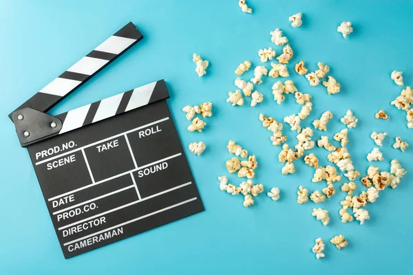 Movie Clapperboard Popcorn Blue Background — Stock Photo, Image