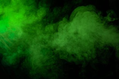 Siyah arkaplanda yeşil duman dokusu