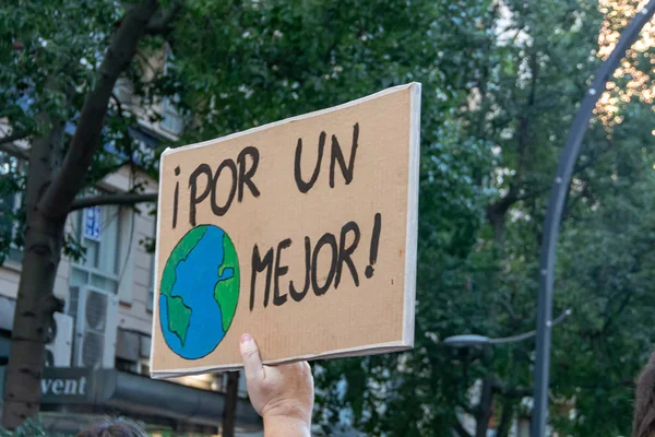 Banner con il motto "Per un mondo migliore" nella Manifestazione — Foto Stock