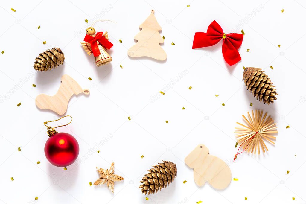 Christmas frame with Christmas toys on a white background