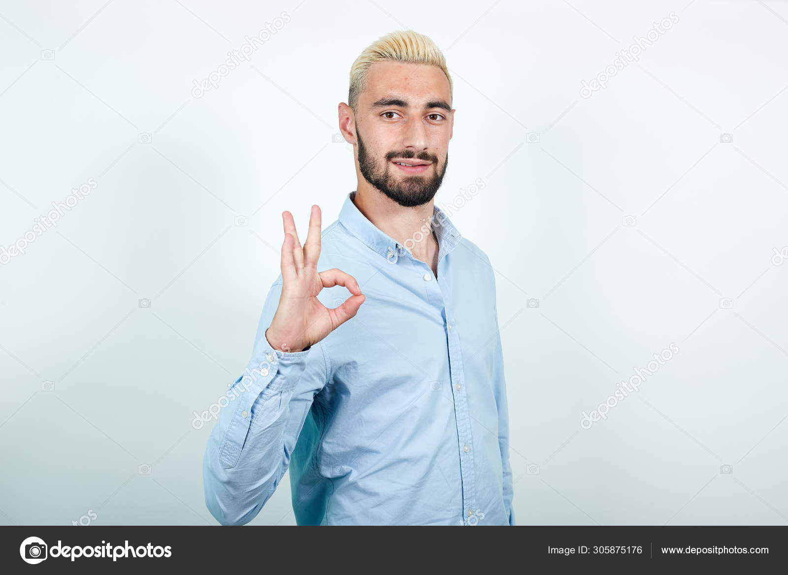 Man With Blond Hair Black Beard Over Isolated White Background