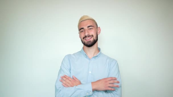 Man with blond hair, black beard over isolated white background shows emotions — Stock Video