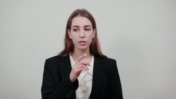 Index finger on lips, silence gesture, shhh quiet, asked for voicelessness — Stok Video