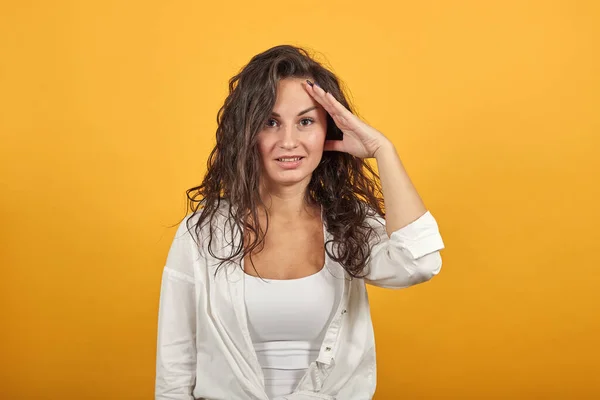 Forgetful holding hand to hair, touches head forgot something important regrets