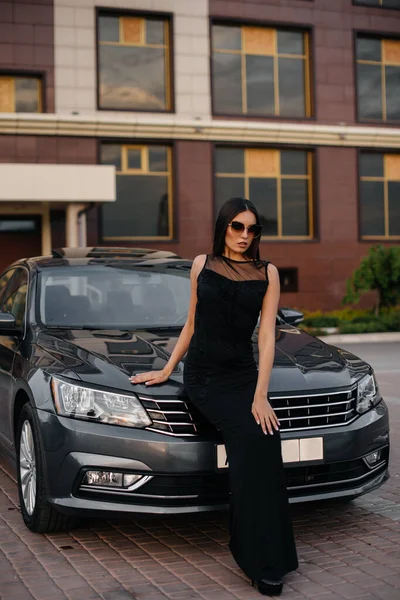 Stylish Young Girl Stands Car Black Dress Business Fashion Style — Stock Photo, Image