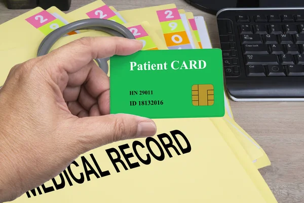 Someone Hand Holding Patient Smart Card Medical Record Floder Background — Stock Photo, Image