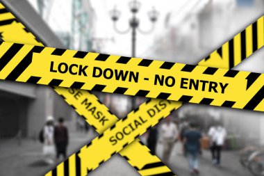 Yellow lockdown caution tape warning to enter public place. clipart