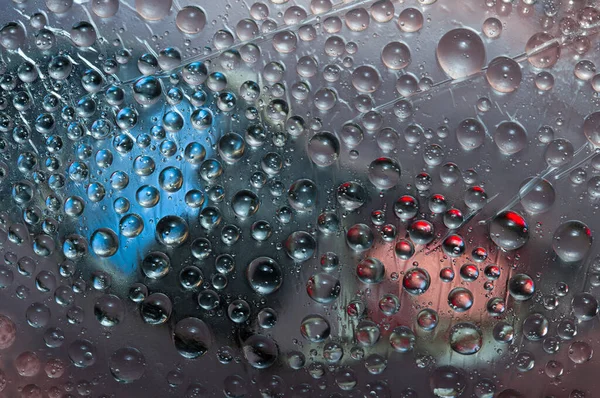 Las Partículas Hielo Redondeadas Encuentran Sobre Fondo Vidrioso Multicolor Con —  Fotos de Stock