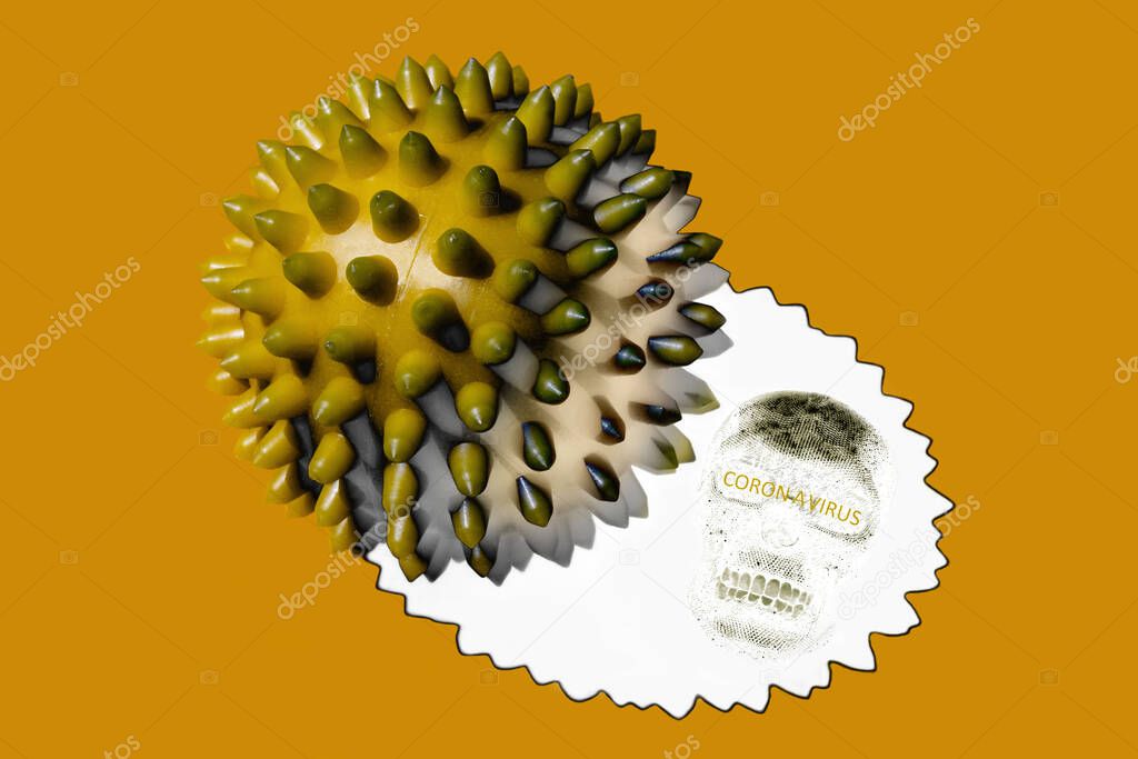 Abstract image of coronavirus. A apricot-brown spiked ball and its white shadow with the silhouette of a skull and hazard warning text are located on a apricot background.