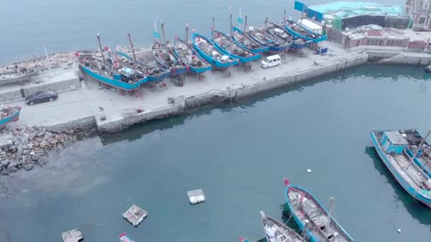 Boats being repaired : wooden fisherman boats during morning with fog Dalian, China, 19-6-19 — Stock Video