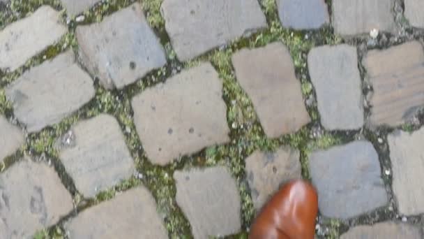 Man Walking Brown Leather Shoes Old Paved Road — Stockvideo