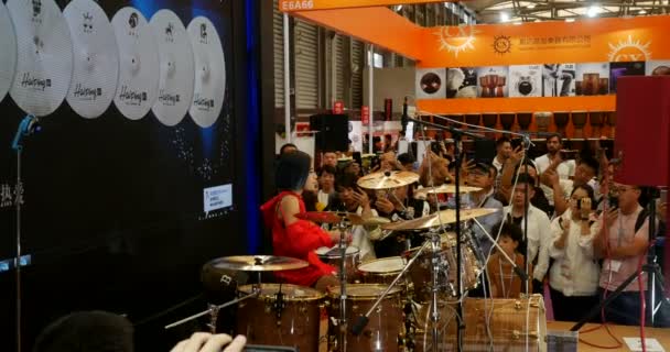 Cute Chinese Female Drummer Performing Music China Shanghai Instrument Fair — Stock video