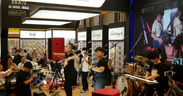 Teen Rock Band Performing Music China Shanghai Messe Instrument Fair — Stock Video