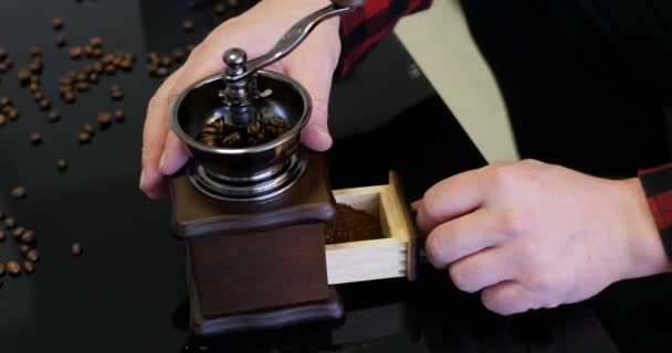 Man Inspecting Fresh Grounded Coffee Beans Antique Traditional Grinder Man — Stockvideo