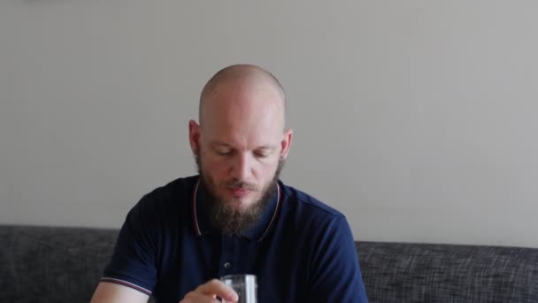 Handsome Bearded Man Happily Drinking Orange Juice Air Bnb Home — Stockvideo