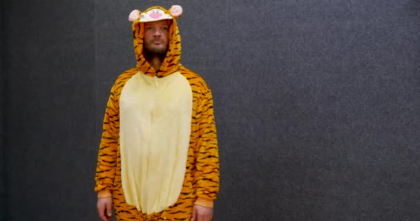 Man Wearing Tiger Clothes Kigurumi Pajama Doing Funny Cute Faces — Stock Video