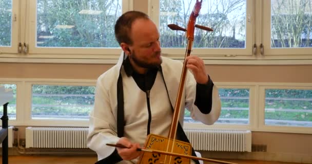 Handsome Caucasian Man Playing Morin Khuur Inner Mongolia Chinese Two — Stock Video