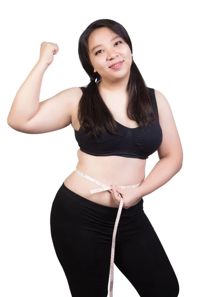 Fet kvinna visar feta kropp tight midja genom att mäta tejp leende ansikte isolerad på vit bakgrund — Stockfoto