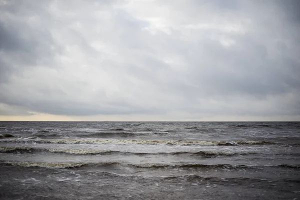 Stormy weather. Waves and clouds over the Baltic sea