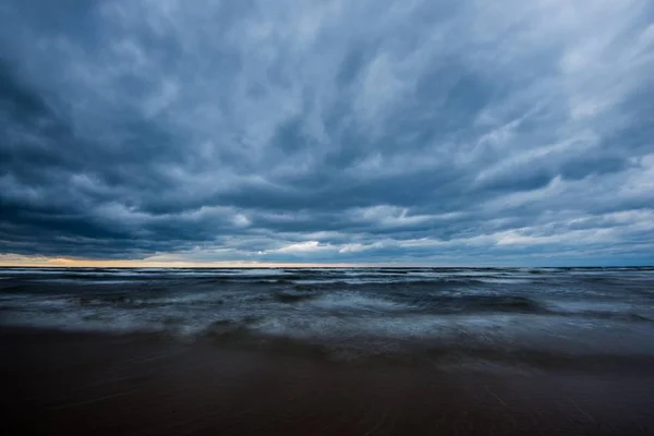 Stormy weather. A view of the Baltic sea and seacoast on a cloudy autumn day, Latvia