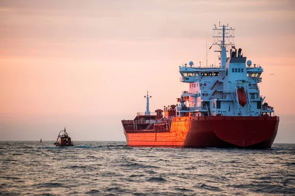 Cargo ship in the Baltic sea at sunset, close-up, Latvia