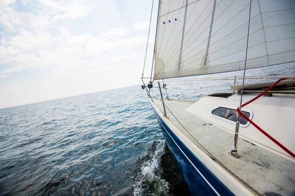 Pure morning light over he Baltic sea. A view from the sailboat\'s deck to the bow, Estonia