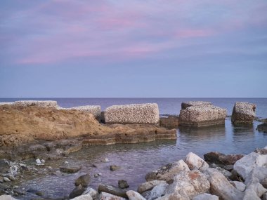 Gün batımında Marzamemi 'de deniz kenarında çekilmiş.