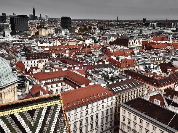 aerial view of cityscape on cloudy sky background