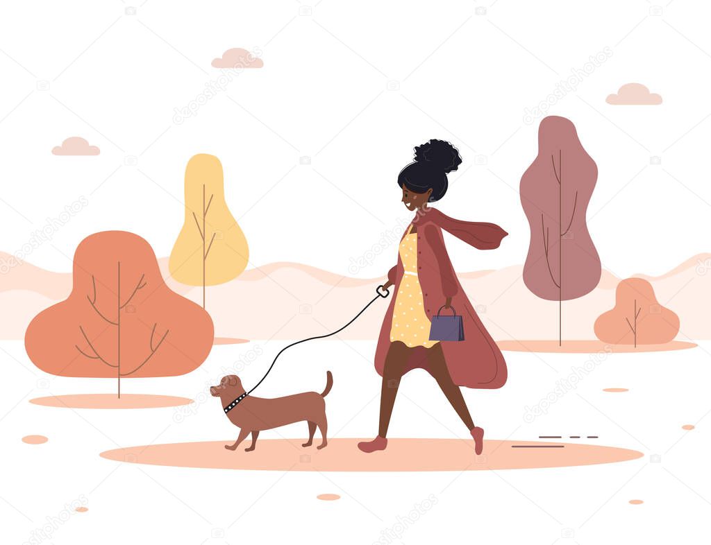 Autumn background. Young african woman walks with dog through the woods. Concept happy girl in brown coat with dachshund or poodle. Vector illustration in flat style.