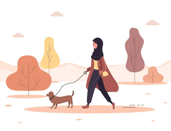 Осенний фон. Молодая арабская женщина в хиджабе гуляет с собакой по лесу. Концепция счастливой девушки в коричневом пальто с таксой или пуделем. Векторная иллюстрация в плоском стиле. — стоковый вектор