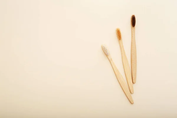 Eco-friendly bamboo tooth brush. Zero waste set on light beige natural background. Flat lay style. — Stock Photo, Image