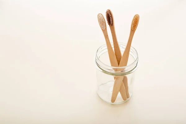 Eco-friendly bamboo tooth brush. Zero waste set on light beige natural background. Flat lay style. — Stock Photo, Image
