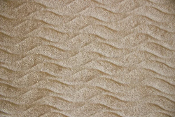 Texture délicate de la couverture, fond pêche moelleux, motif — Photo