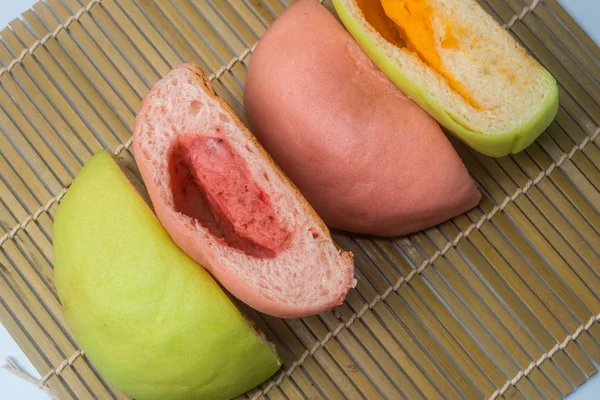 Japanese Snack - Colorful Melon Pan on rattan mat — Stock Photo, Image