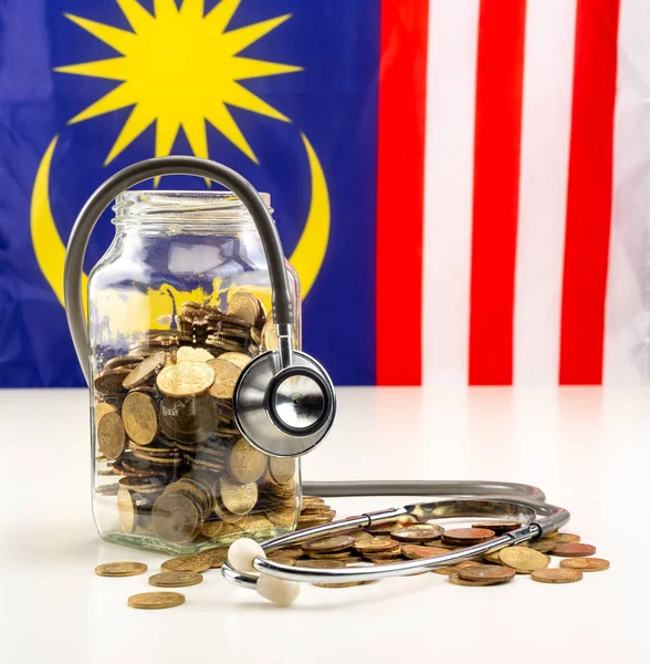 Savings for Health. Malaysia Flag in the background. Education f