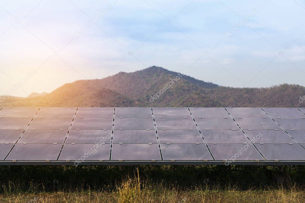 Close up array of  thin film solar cells or amorphous silicon solar cells or photovoltaics in solar power plant turn up skyward absorb the sunlight from the sun use light energy to generate electricity alternative renewable energy from the sun 