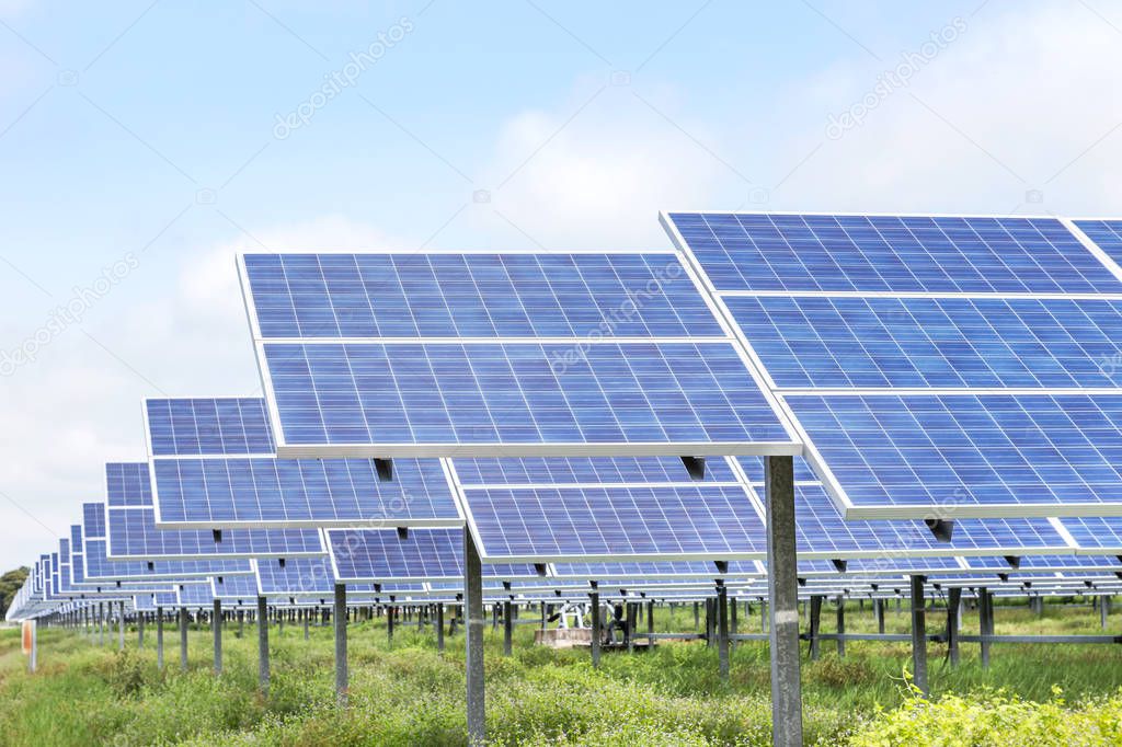 Close up rows array of solar cells or photovoltaics in solar power station alternative clean renewable energy efficiency