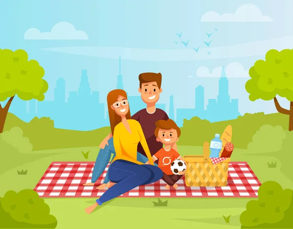 Mutlu aile piknik üzerinde rahatlatıcı. Anne, baba ve oğul Park. 