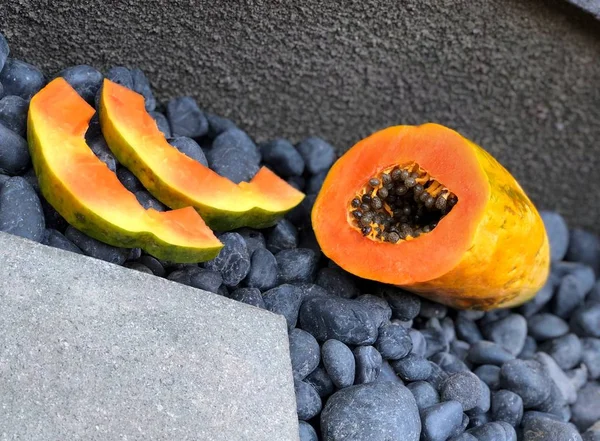 Creative food concept of papaya fruit.  Healthy food , exotic fruit , detox , beautiful food