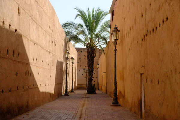 Morocco Marrakesh red city medina street photo, ramparts of beaten clay