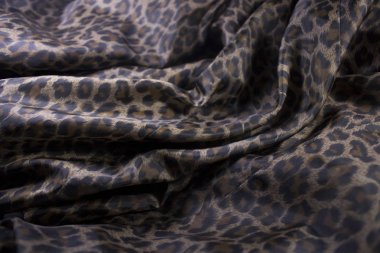 arka plan olarak leopar desenli kumaş görünümünü kapat